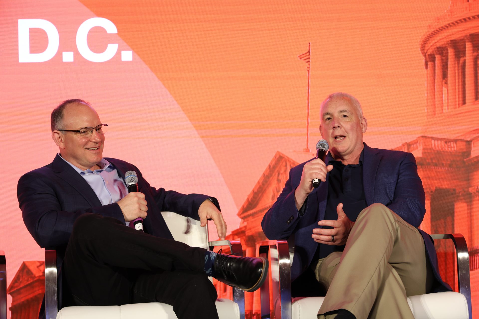 DIA CFO Steven Rush (right) speaks to UiPath's VP David Melvin on April 17, 2024. (Photo by Scoop News Group)