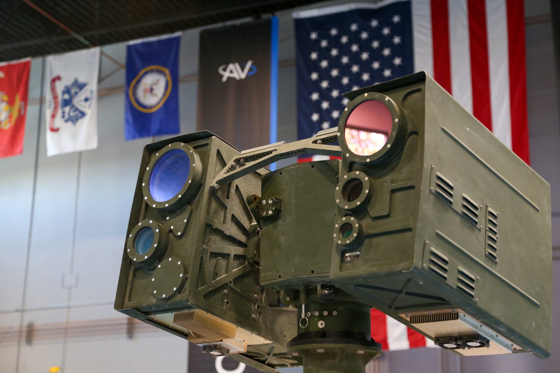 AeroVironment LOCUST X3 30-kilowatt directed-energy laser weapon system mounted on a military vehicle for counter-drone defense